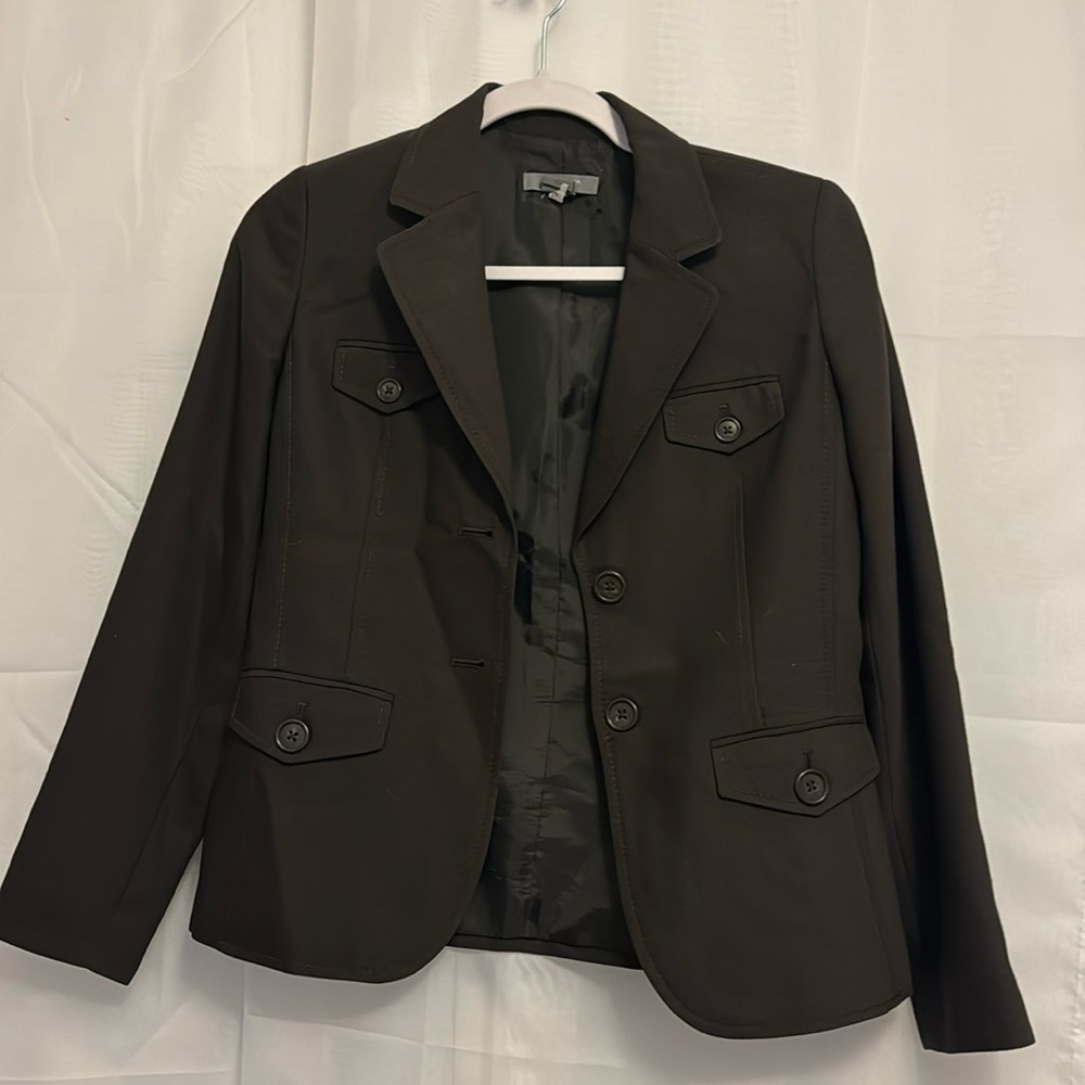 Beautiful, brown suit with unique detailing. Excellent condition!